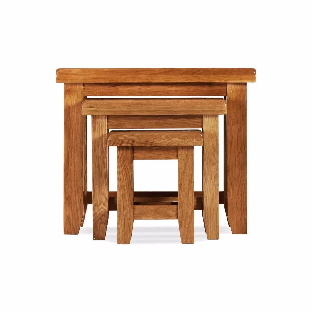 Oak nesting tables set of three with clean lines, stacked front view on white background