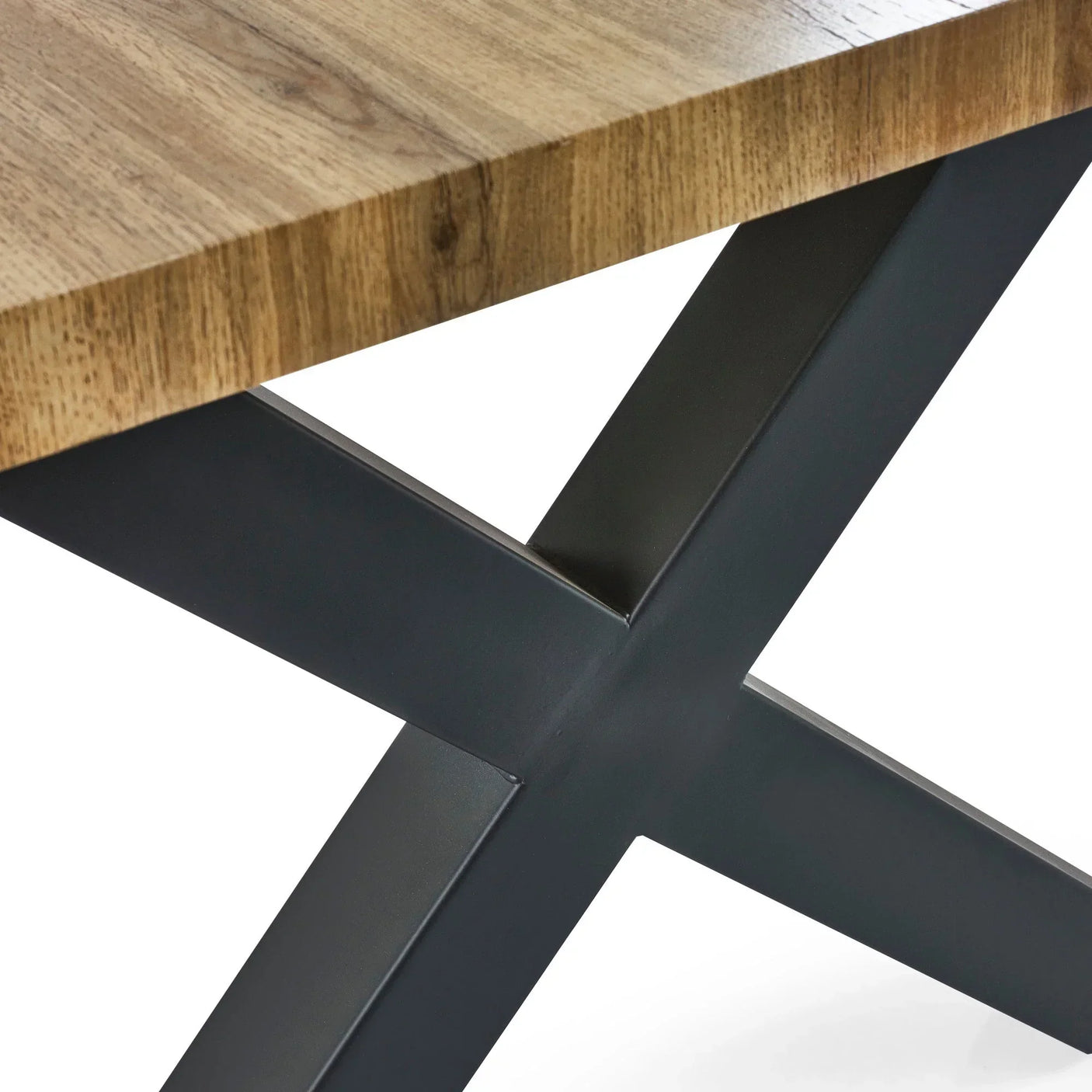 Coffee table corner with oak effect top and black metal cross leg detail