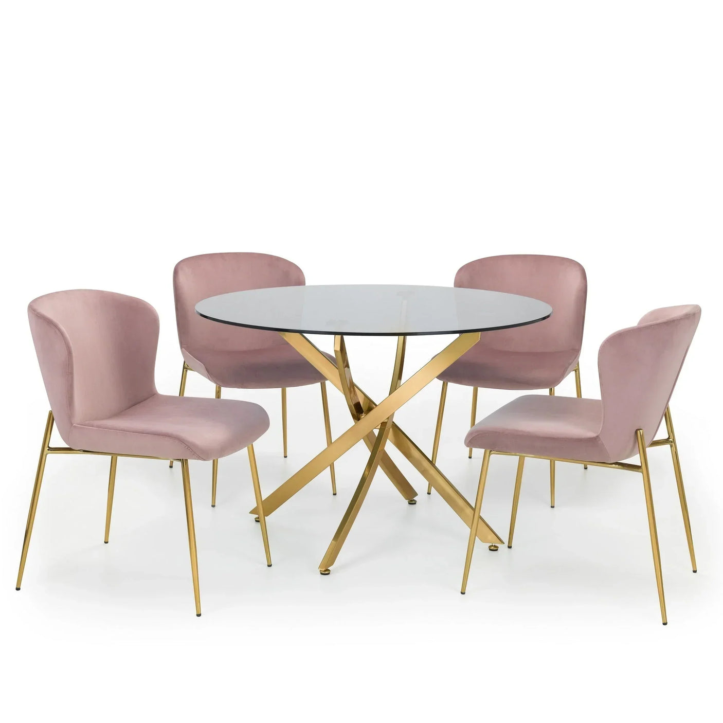 Round glass dining table with gold metal base and four pink velvet upholstered chairs