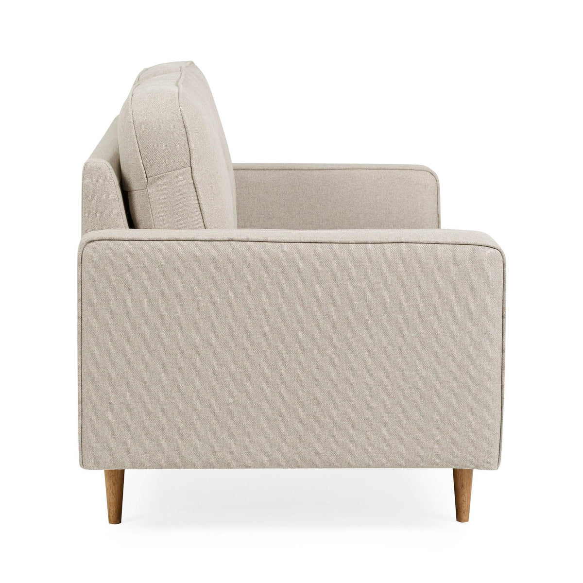 Side view of beige fabric sofa with wooden legs and box armrest