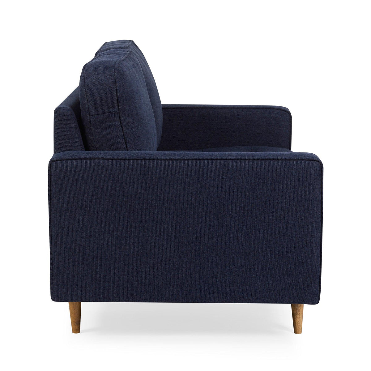 Side view of navy fabric sofa with wooden legs and square armrest