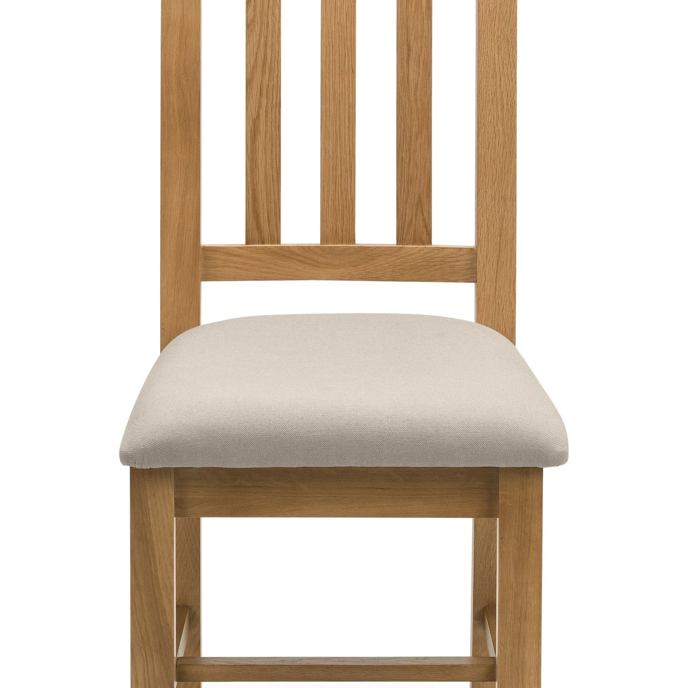 Oak dining chair with slatted back and light fabric padded seat, front view