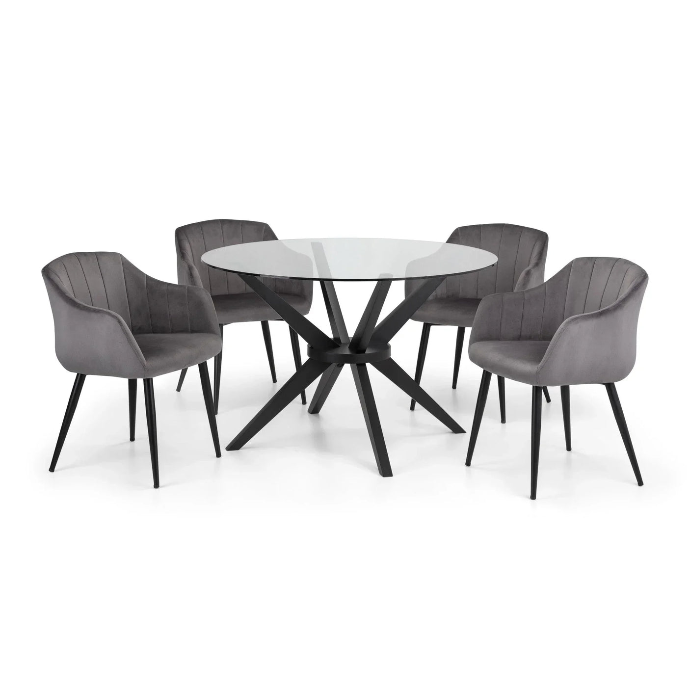 Round glass dining table with black legs and four grey velvet dining chairs