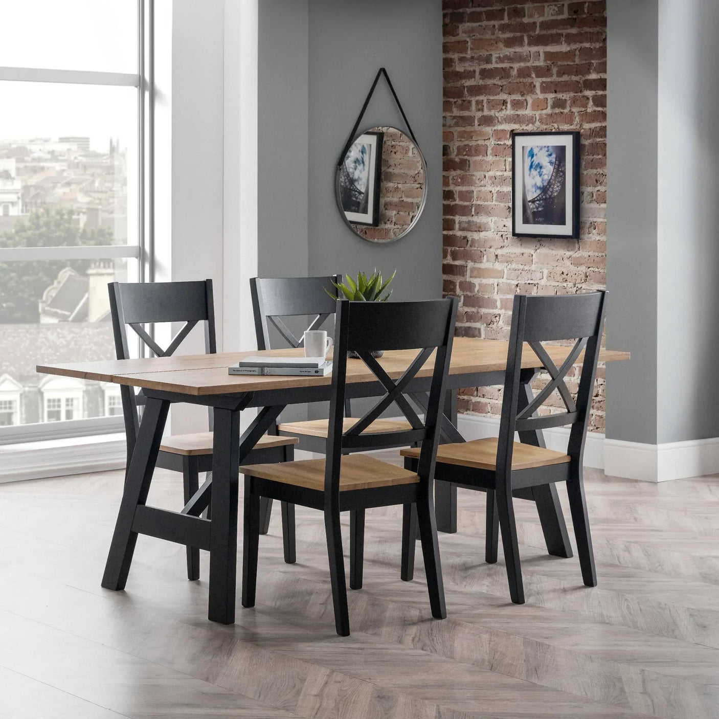 Black and oak dining set with four chairs and table in modern dining room