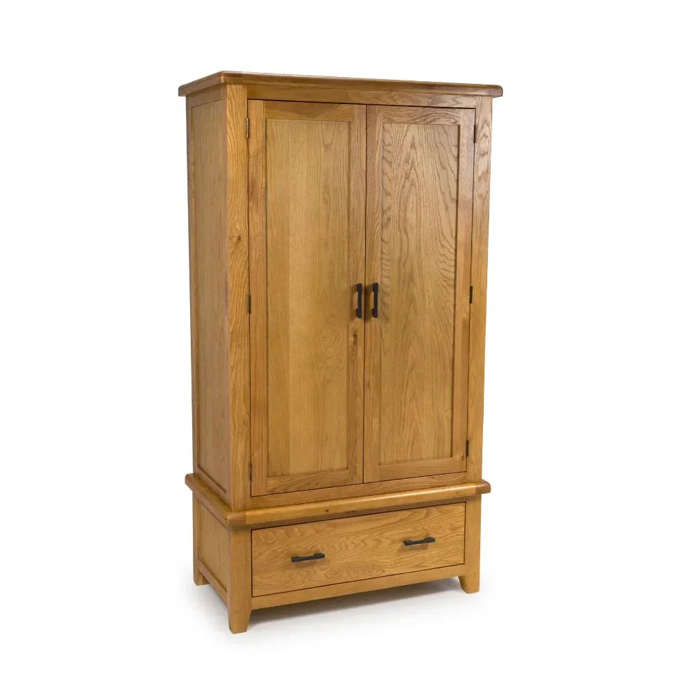 Oak wardrobe with double doors and lower drawer, metal handles, natural wood finish