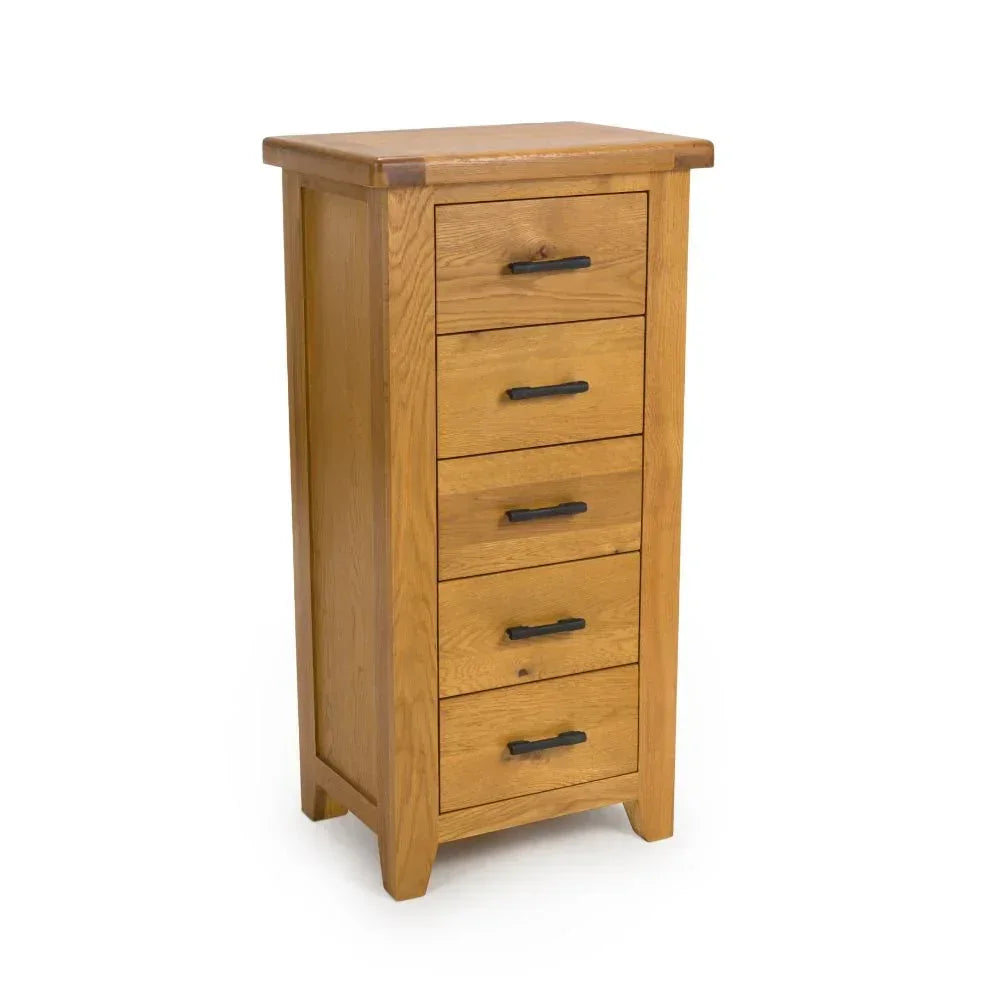 Tall oak chest of drawers with five black metal handles, suitable for bedroom storage