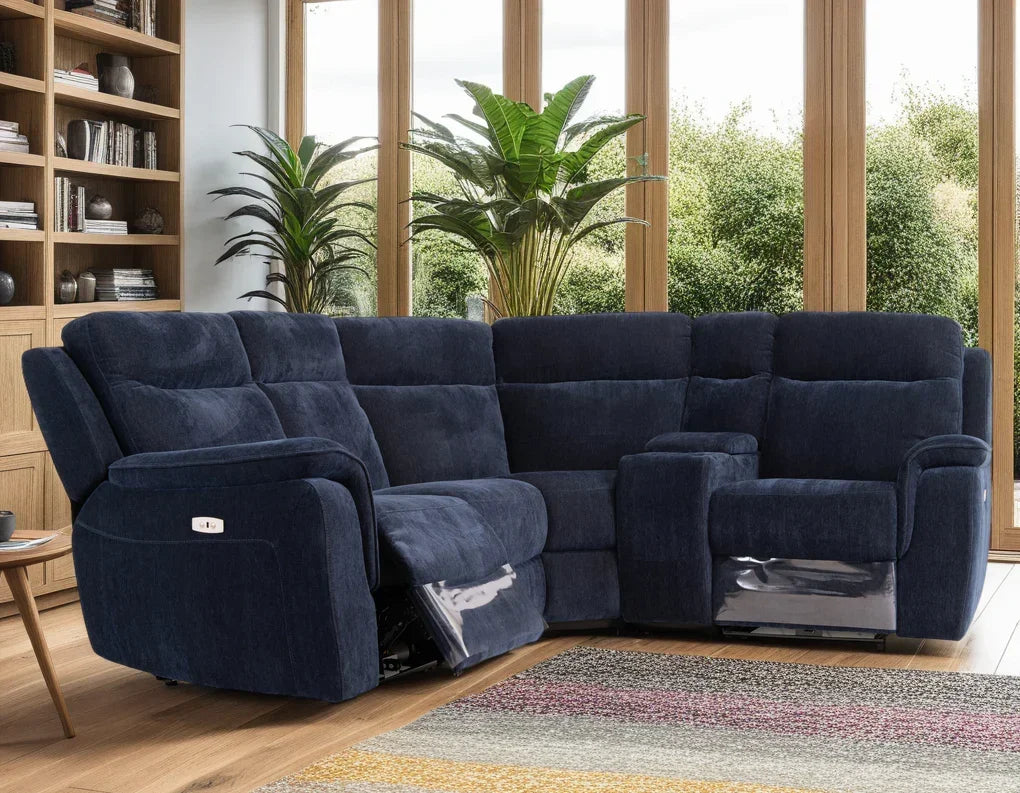 Navy blue corner sofa with recliner seats and armrest in a modern living room