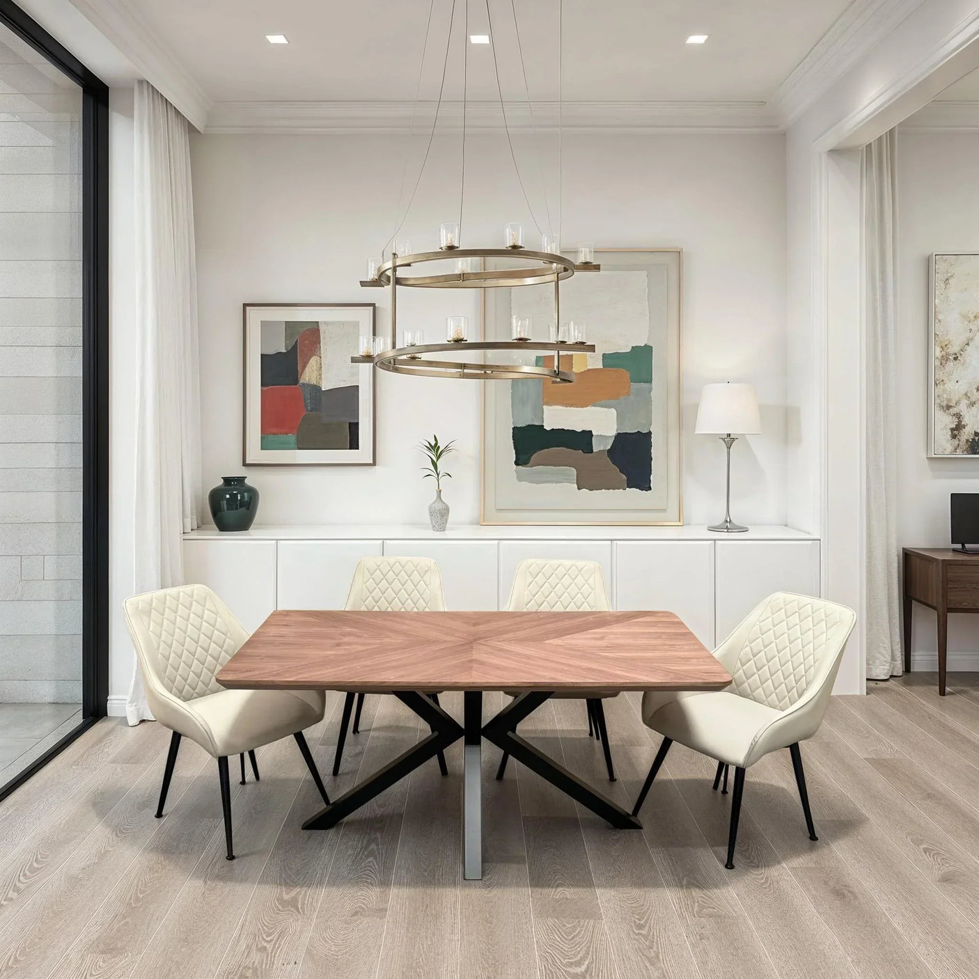 Rectangular wooden dining table with geometric metal legs and five cream quilted chairs