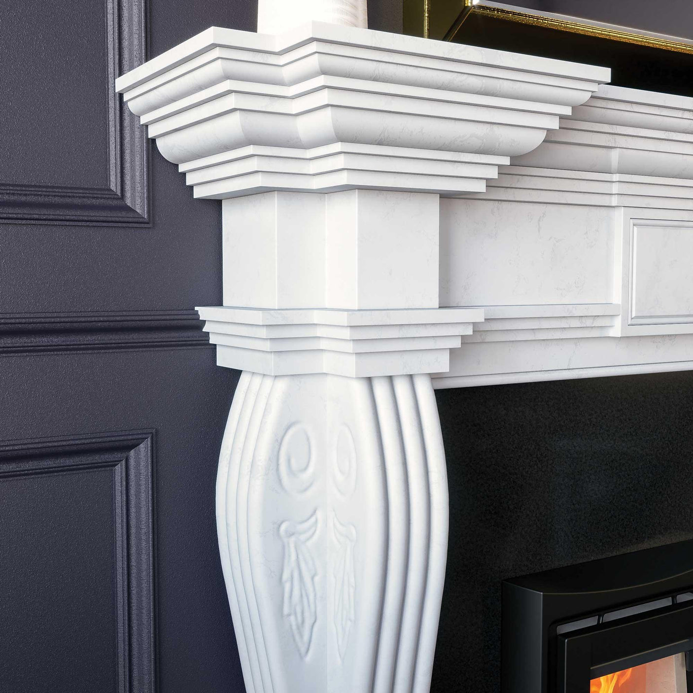 White marble fireplace surround with ornate carved column and layered mantel detail