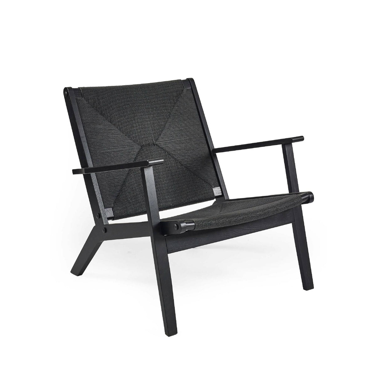 Black lounge chair with woven seat and backrest, angled wooden arms and legs