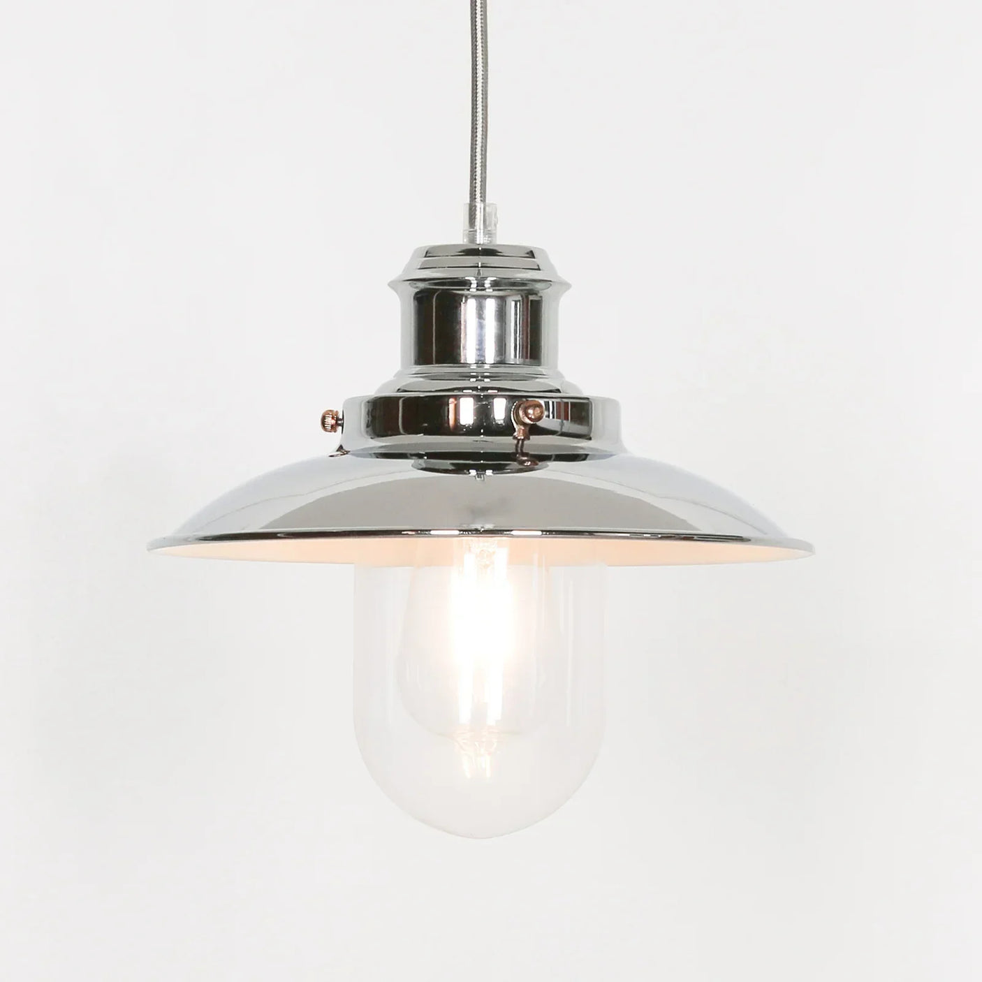 Chrome pendant ceiling light with glass shade and exposed bulb, industrial style lighting