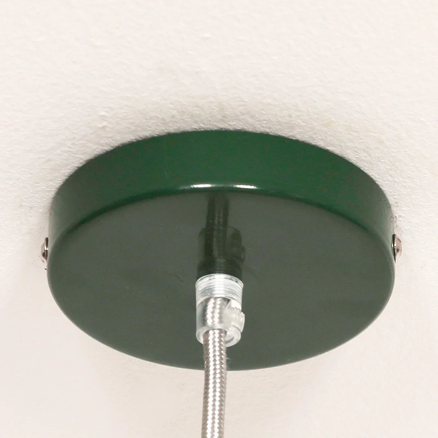 Green metal light fixture ceiling rose with exposed cable fitting