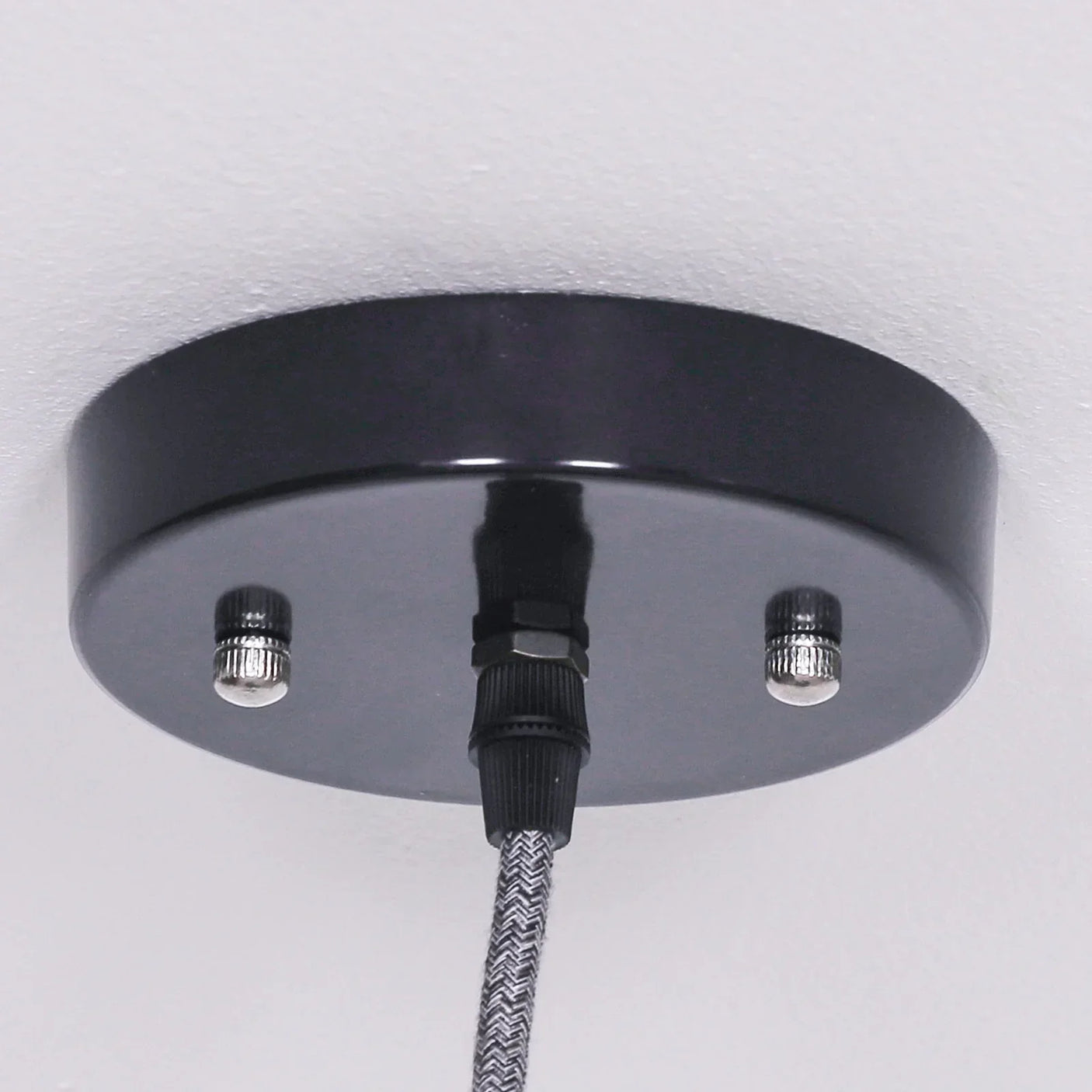 Black ceiling rose pendant light fitting with braided cable and metal fixings