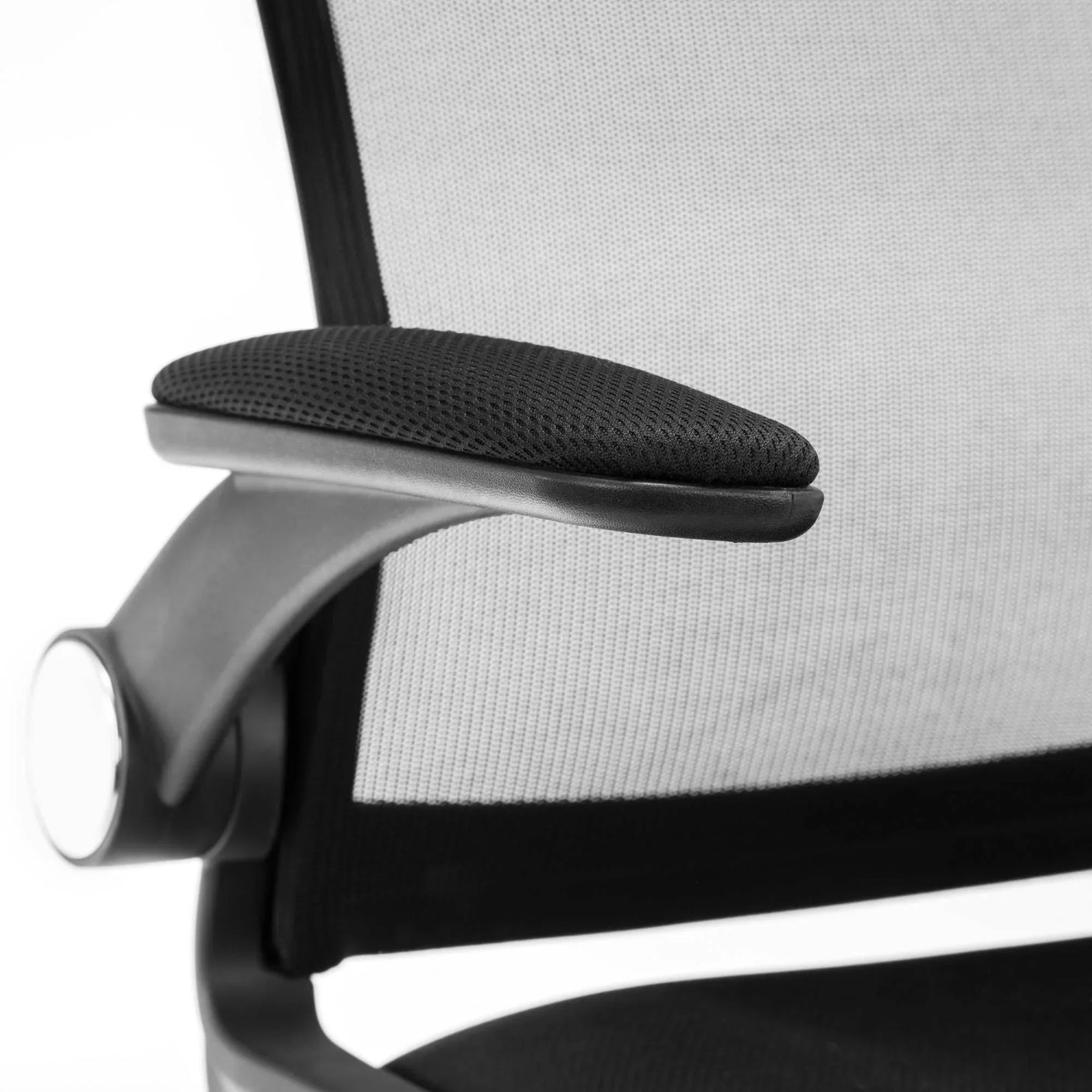 Ergonomic office chair with black mesh armrest and breathable mesh back detail