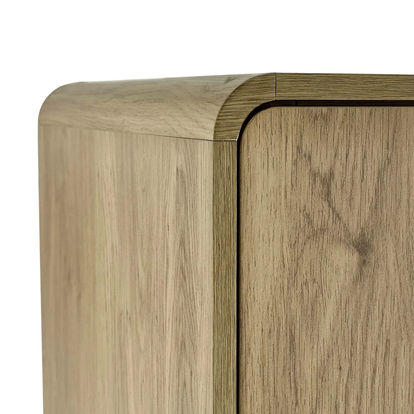 Close-up of oak cabinet corner with rounded edge and wood grain finish