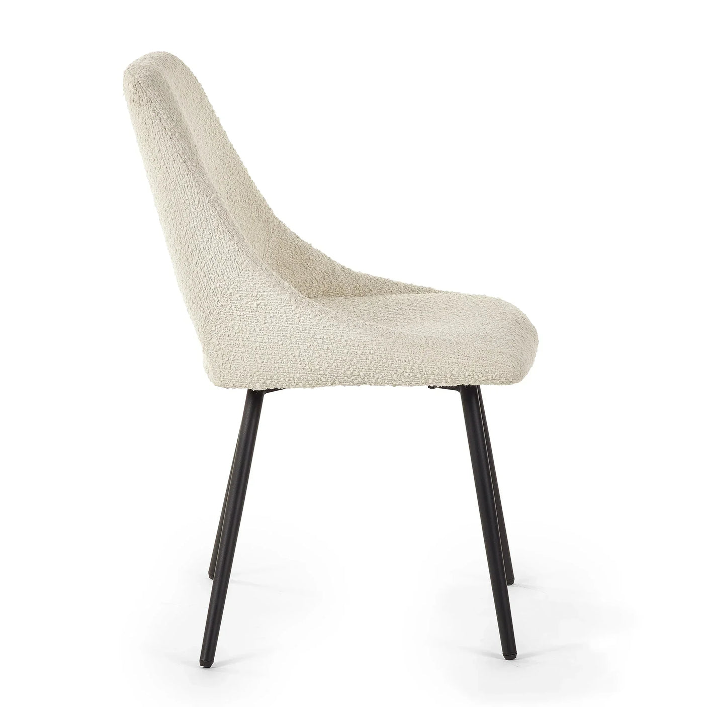 Boucle dining chair in cream fabric with black metal legs, side angle view