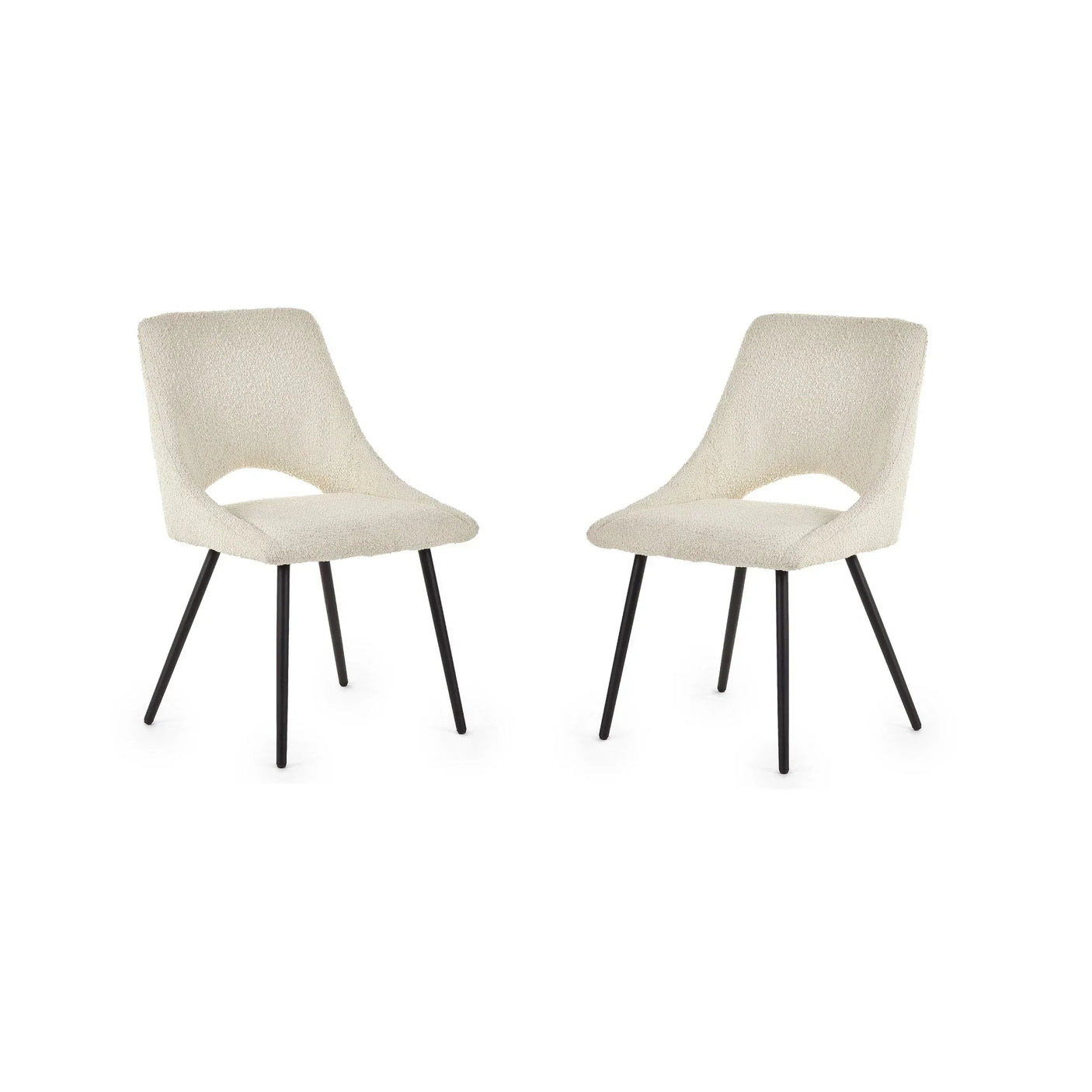 Ivory boucle dining chairs with black metal legs, angled cutout back, set on white background
