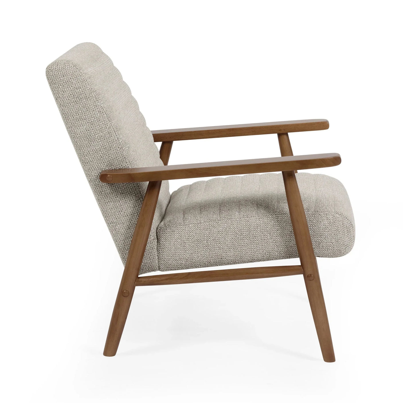 Side view of a beige fabric armchair with wooden frame and angled legs