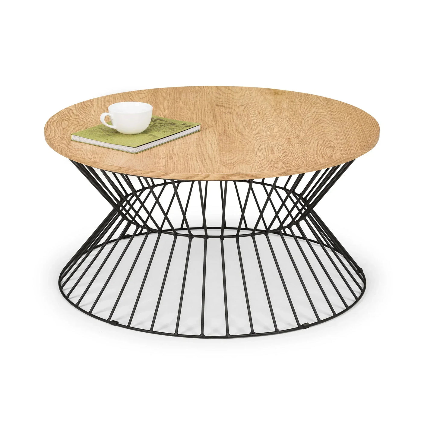 Round coffee table with light wood top and black metal wire base, cup and book on surface