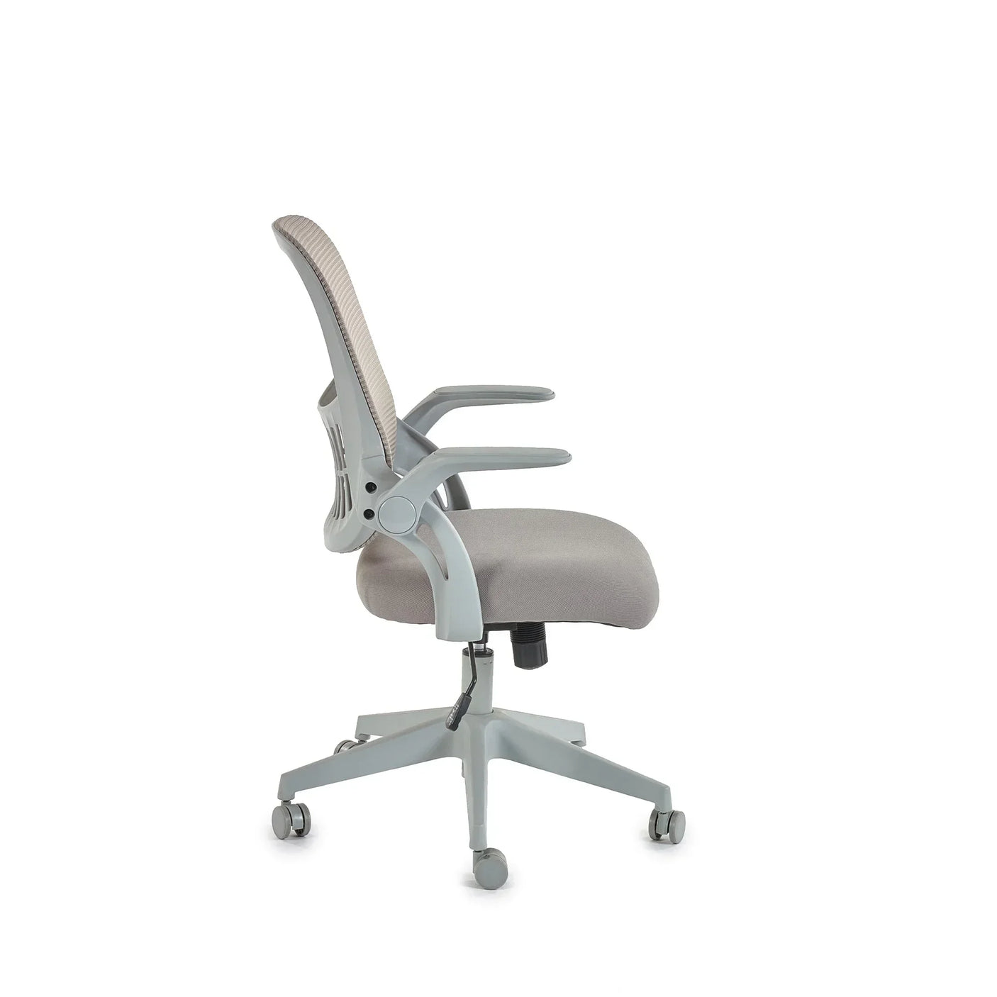 Side view of grey office chair with mesh back, padded seat, armrests and caster wheels