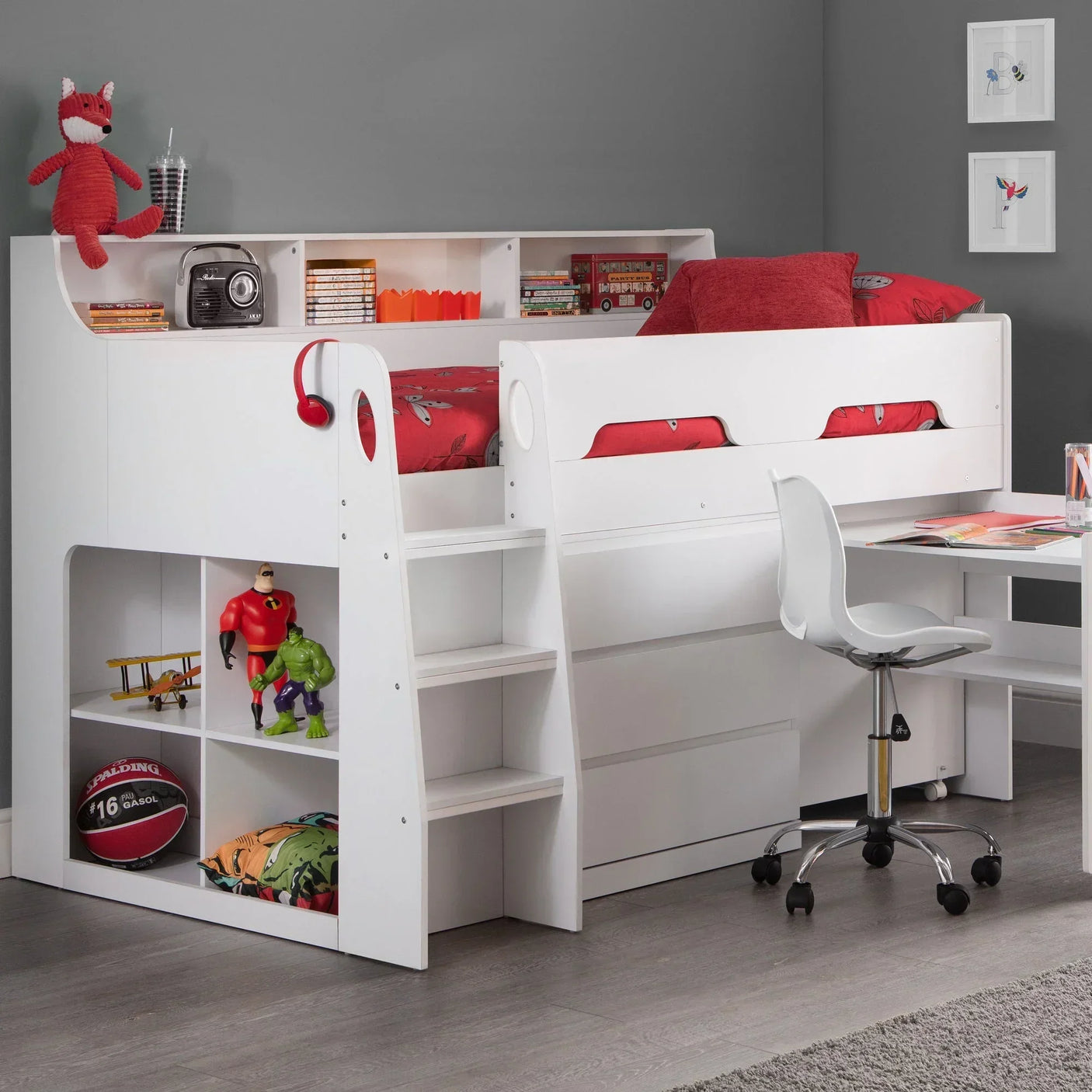 White midsleeper bed with ladder, red bedding, shelving, pull-out desk, and storage drawers