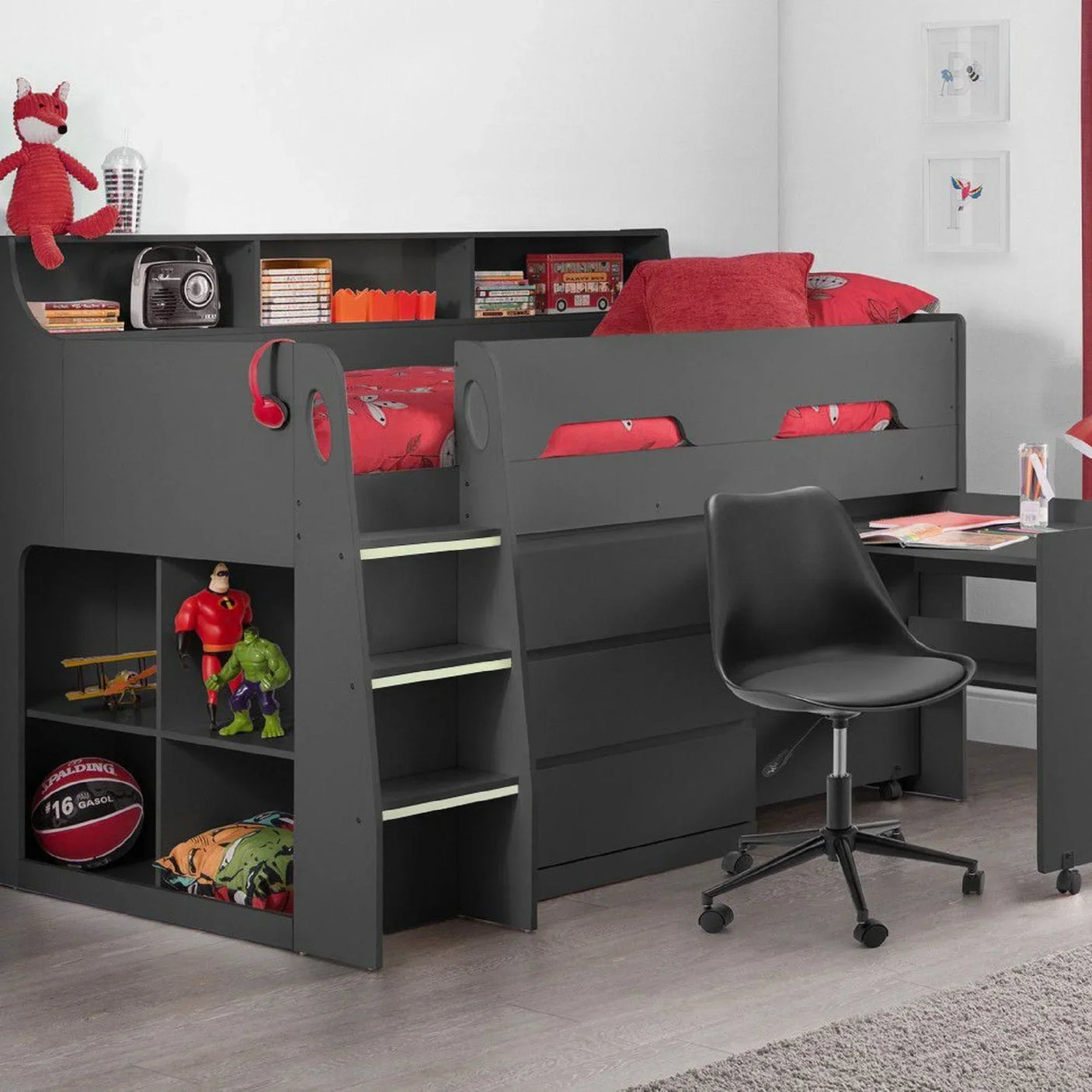 Anthracite midsleeper bed with built-in storage, desk, and black swivel chair in kids room
