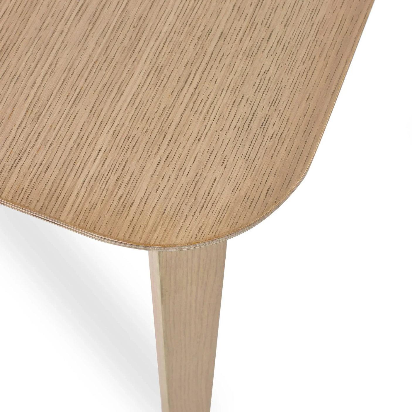 Kaito side table close-up showing light oak wood grain and rounded edge corner