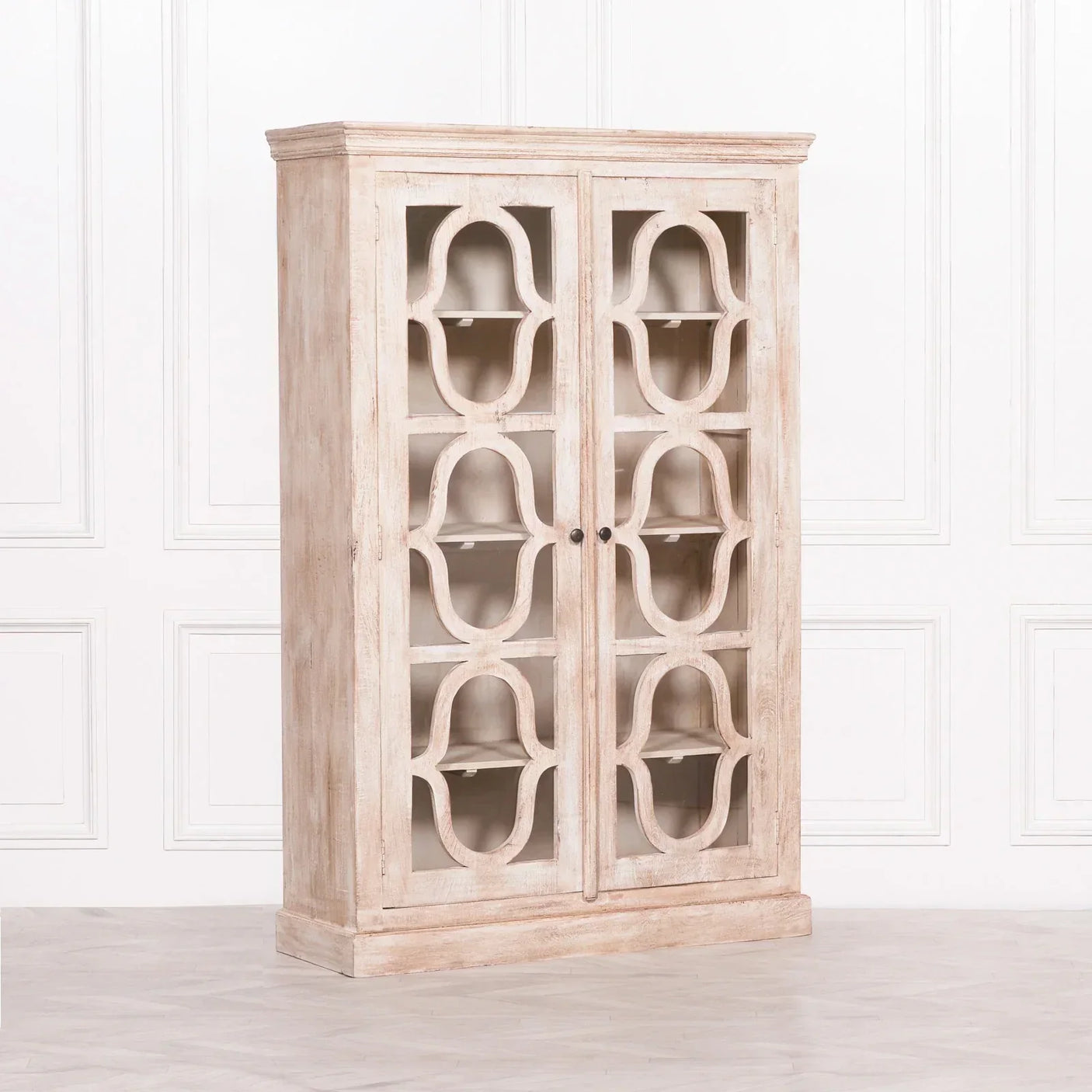 Wooden display cabinet with glass double doors and decorative lattice pattern