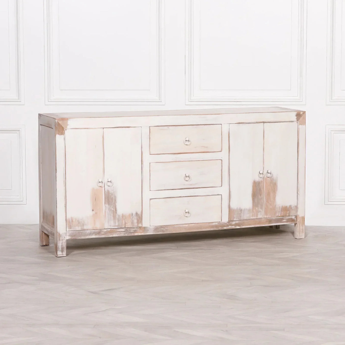 Distressed wood sideboard with three central drawers and two double-door cabinets