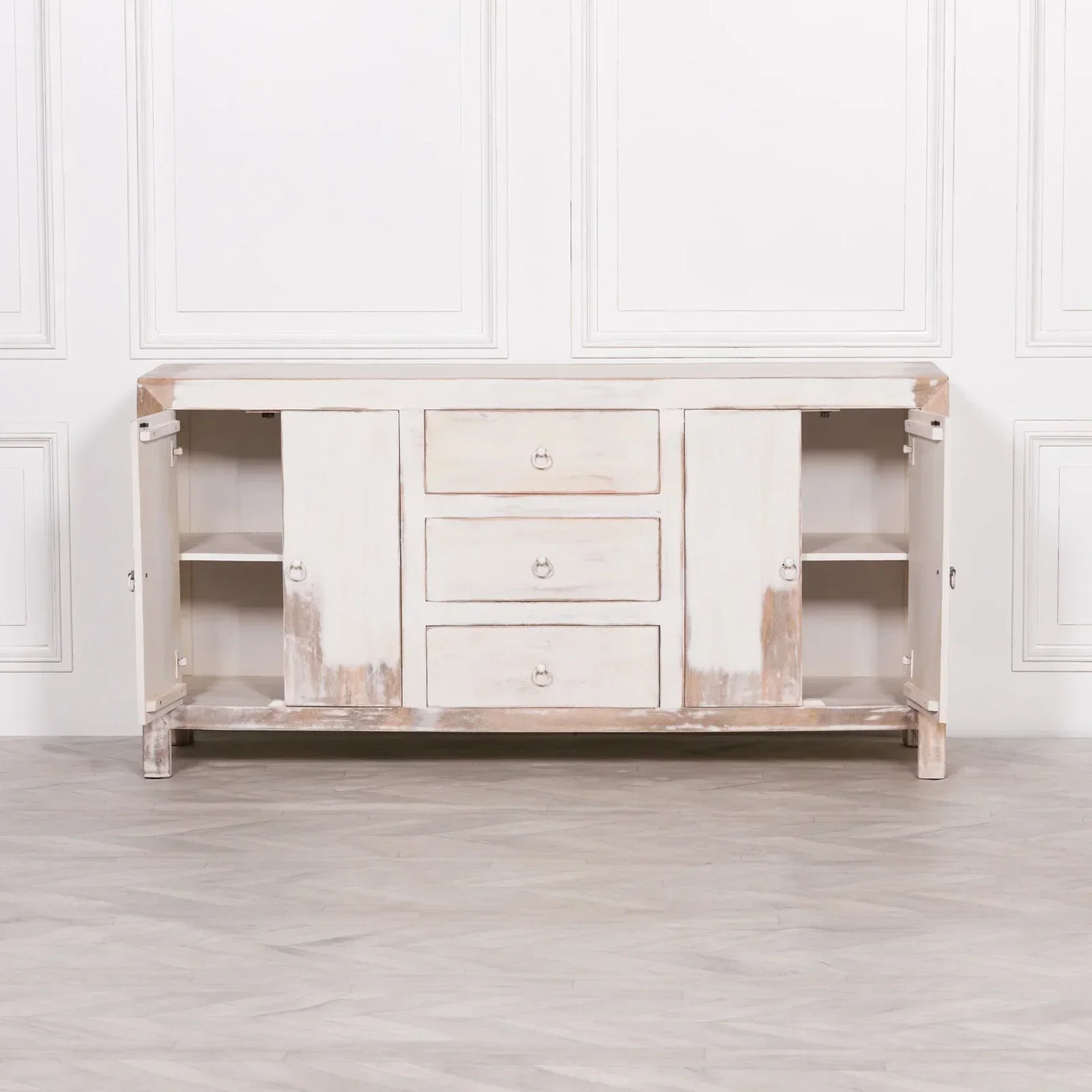 Distressed wood sideboard with three drawers and two open cabinet doors revealing shelves
