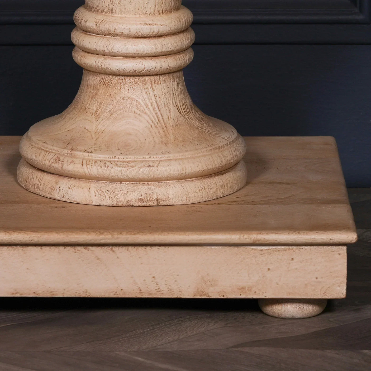 Natural wood table base with square plinth and turned pedestal detail
