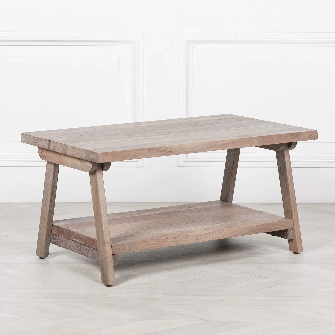 Solid wood coffee table with shelf in natural finish on light flooring
