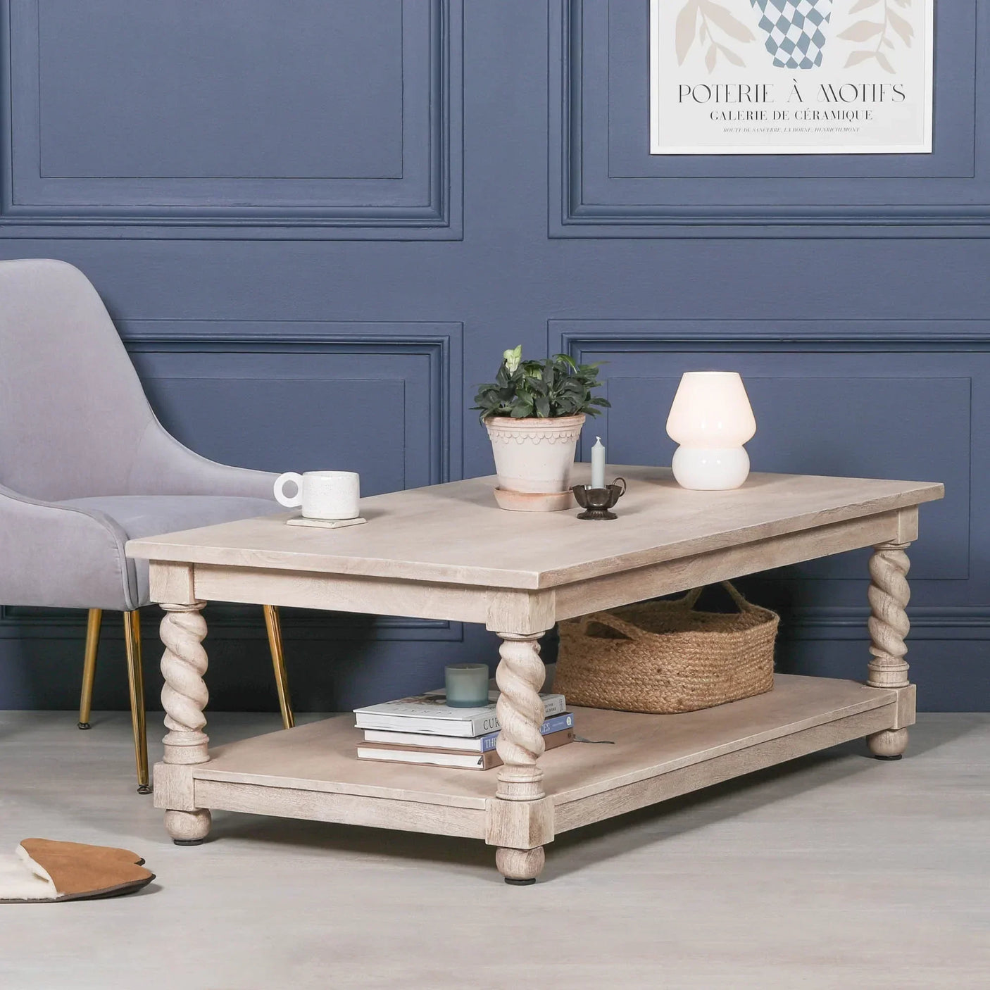 Light oak coffee table with twisted legs, shelf, and decor in living room setting