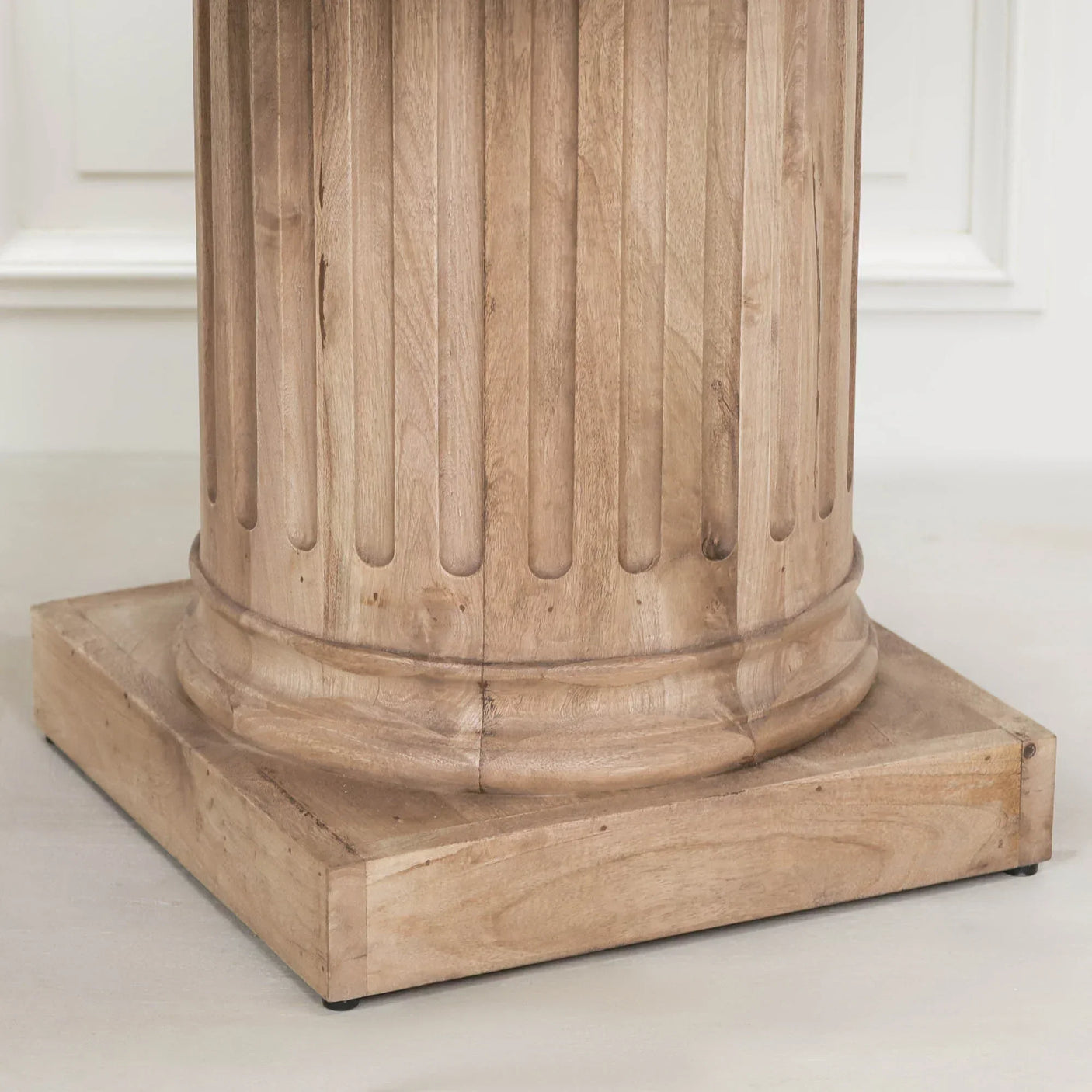 Natural wood dining table pedestal base with fluted column design and square plinth