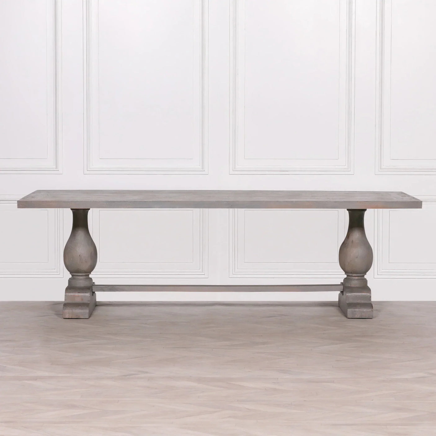 Rectangular wood dining table with double pedestal base and natural finish