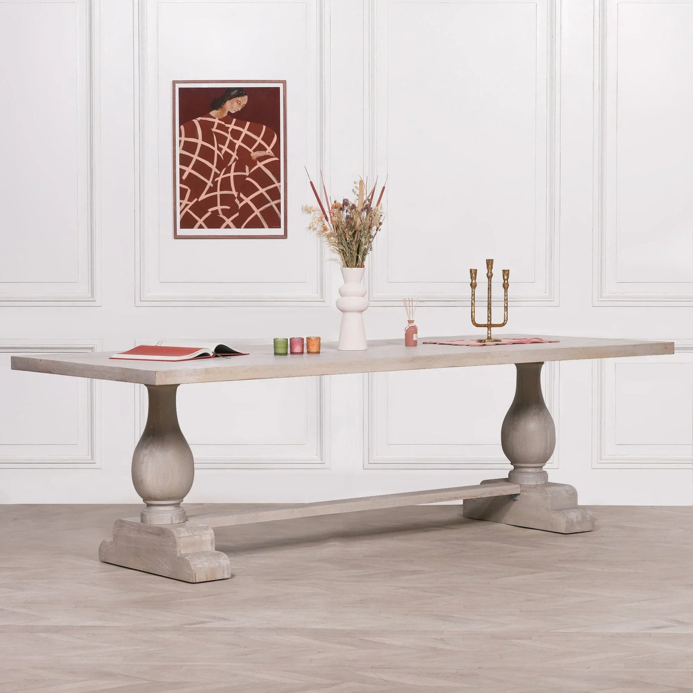 Rectangular wooden dining table with pedestal base in modern dining room setting