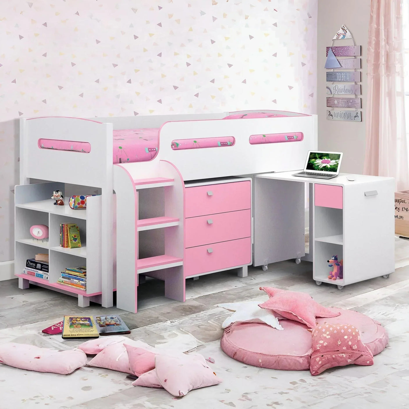 Pink cabin bed with desk, drawers, shelves and star cushions in a girl's bedroom
