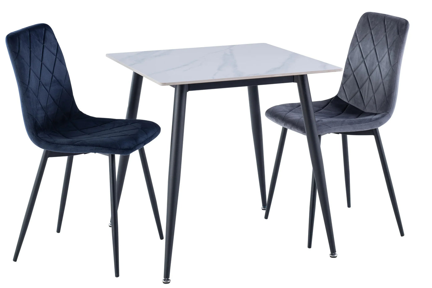 Velvet dining chairs with diamond stitching beside square white marble effect dining table