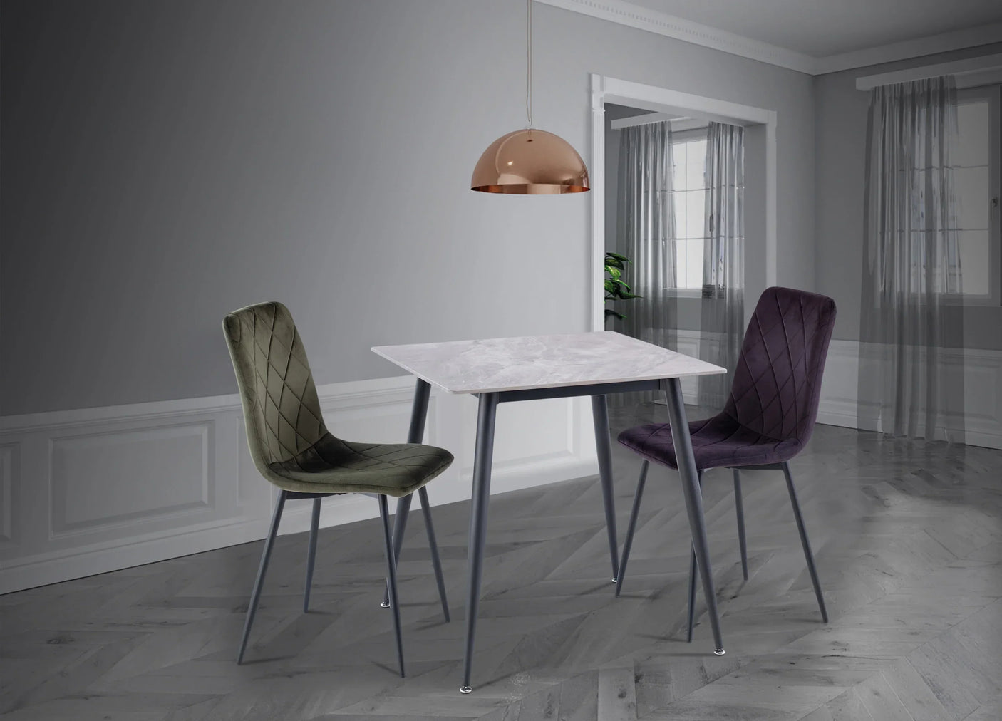 Bella velvet dining chairs with metal legs and marble dining table in modern room