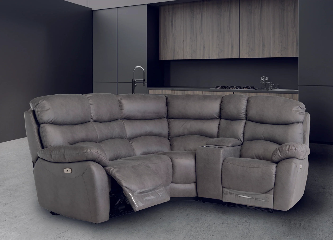 Grey corner reclining sofa with cup holders and padded seats in modern kitchen setting