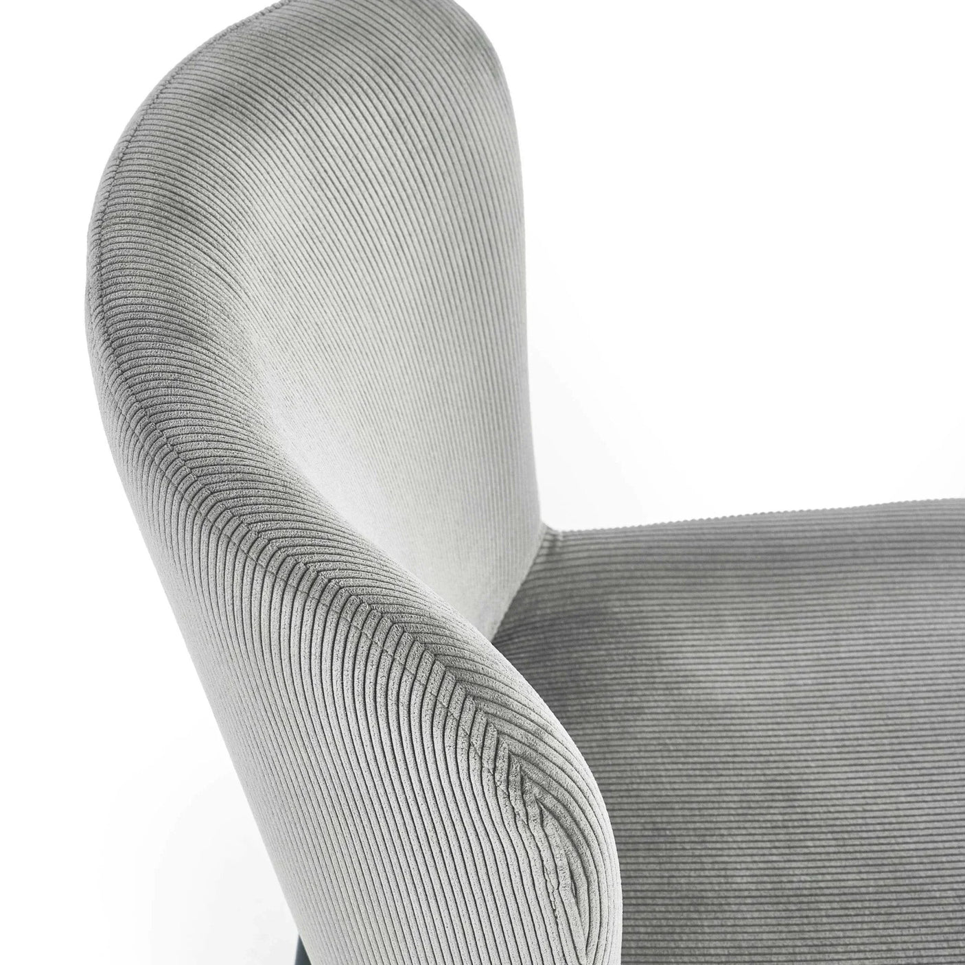 Grey fabric dining chair with curved backrest and ribbed upholstery detail