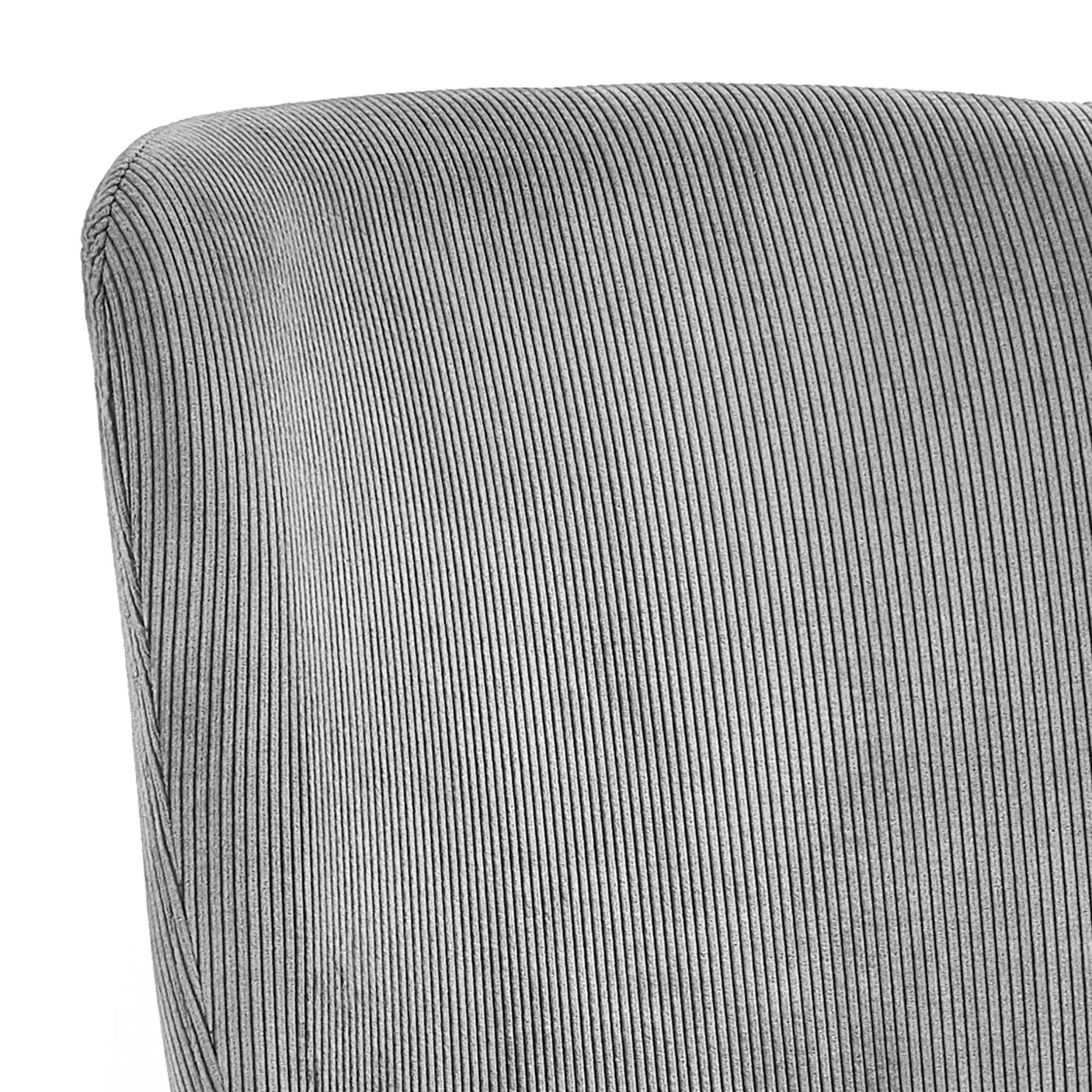 Close-up of grey corduroy chair backrest with vertical ribbed upholstery detail