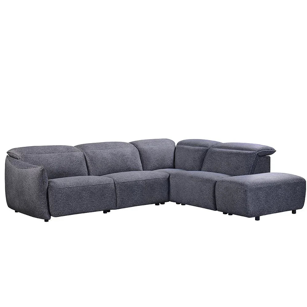 Grey fabric corner sofa with low backrest and chaise lounge section, shown from front angle