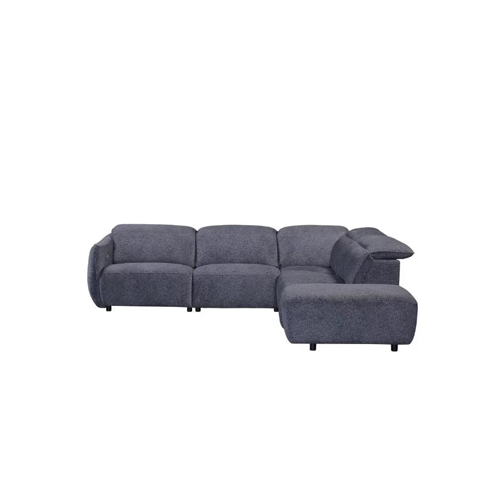 Grey fabric corner sofa with chaise, low profile modern seating, isolated on white background