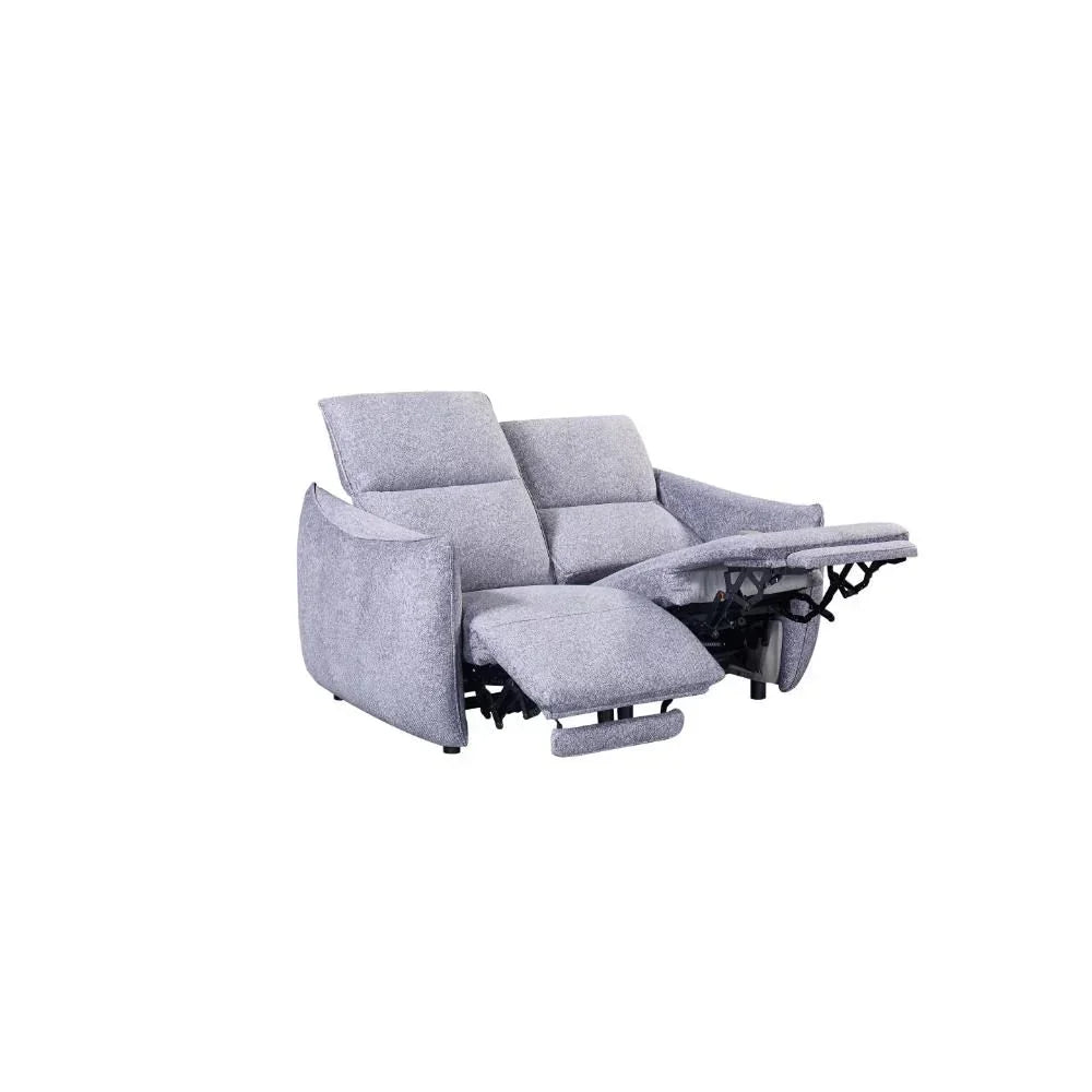 Grey fabric recliner sofa with extended footrests and padded cushions, angled view