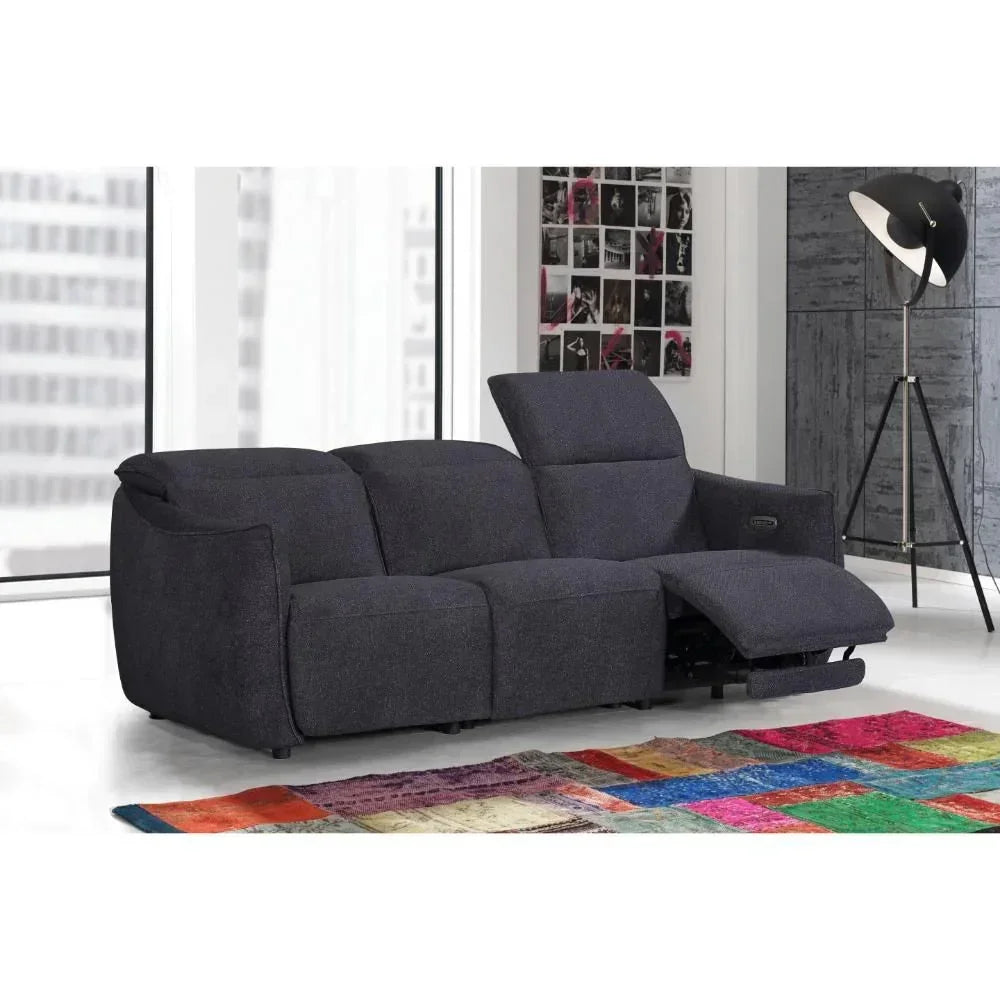 Dark fabric reclining sofa with extended footrest in modern living room