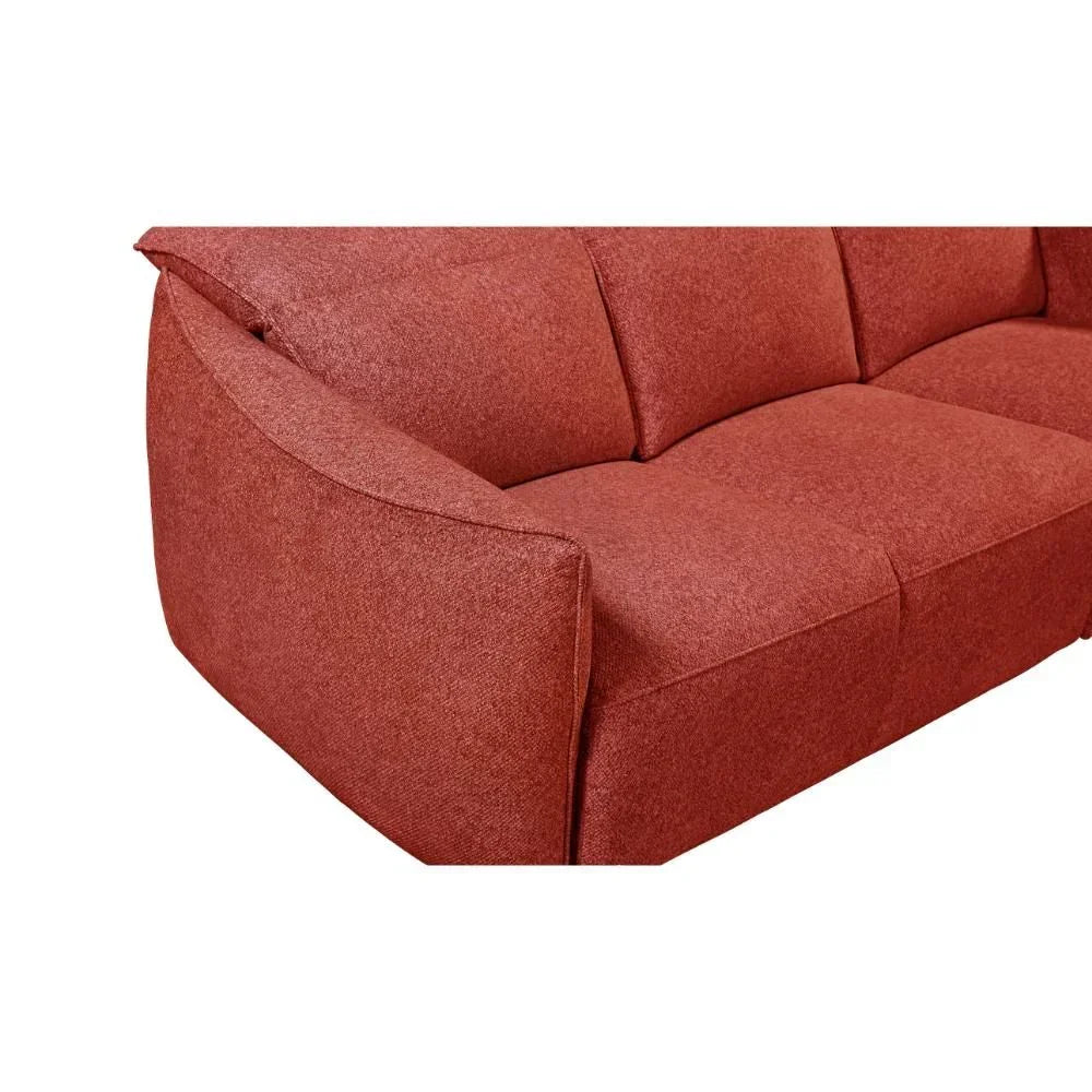 Red fabric sofa close-up showing seat cushions and armrest