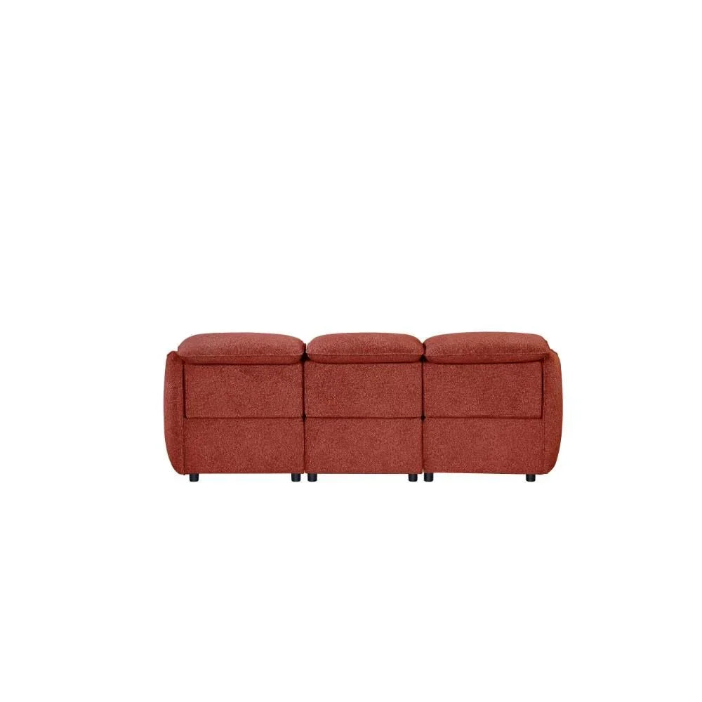 Rear view of red fabric reclining sofa with three cushioned seats