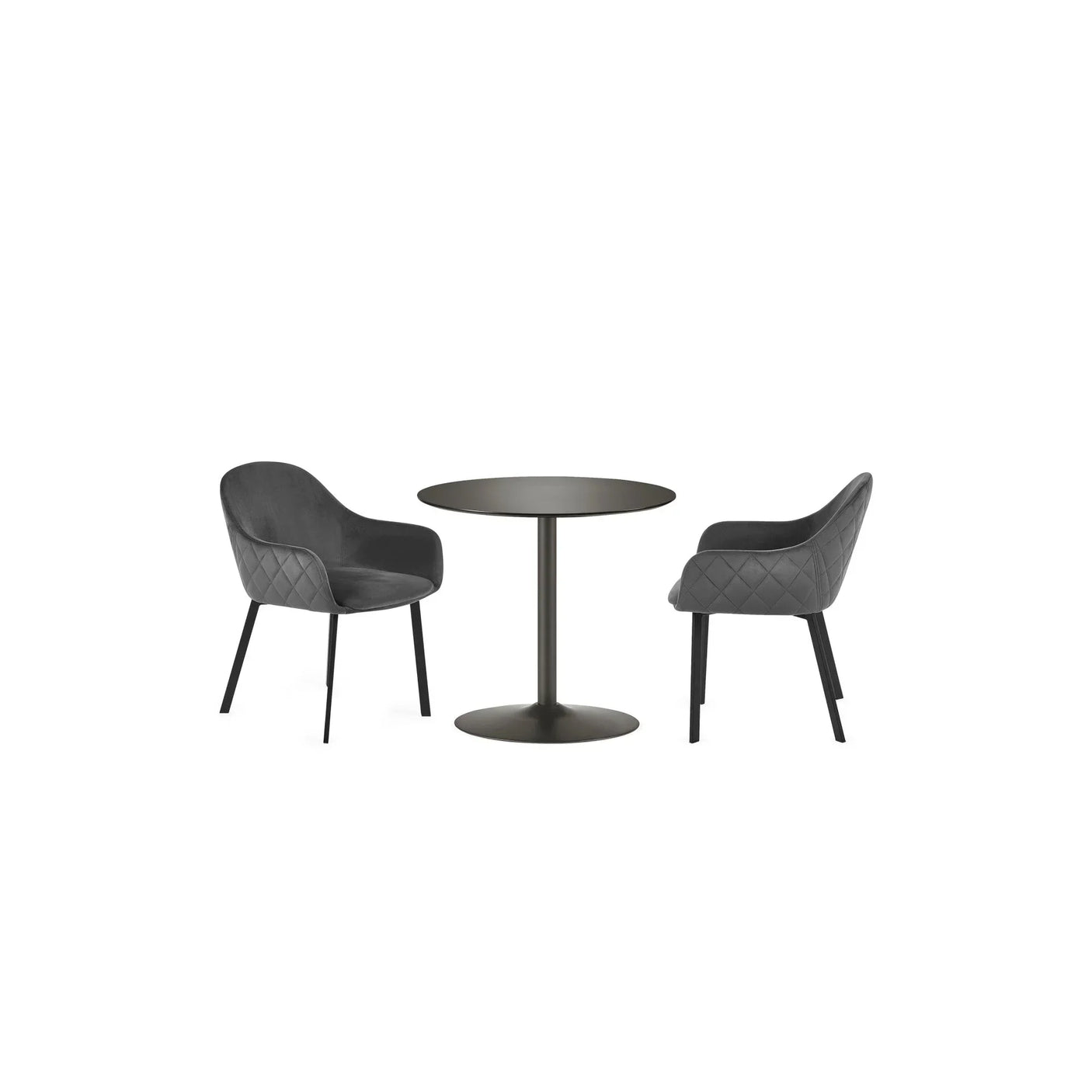 Black round dining table with two quilted grey velvet dining chairs