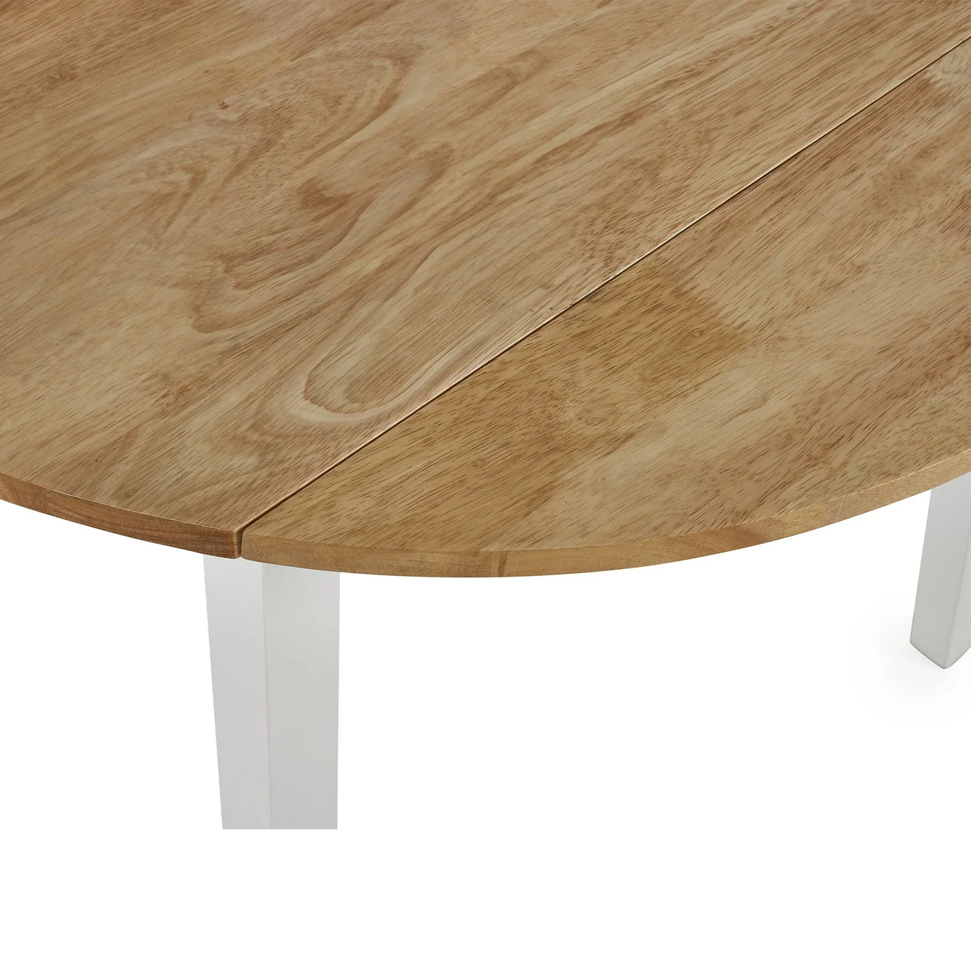 Close-up of round drop leaf dining table with natural wood top and white legs